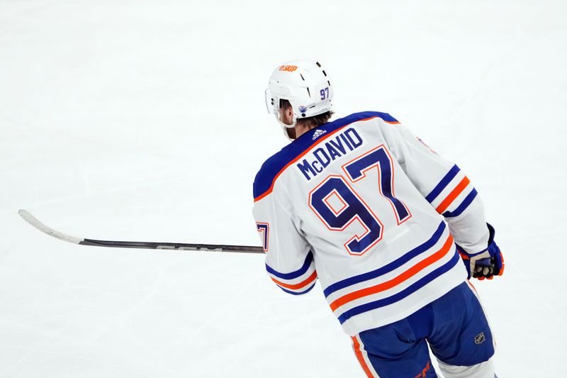 Feb 19, 2024; Tempe, Arizona, USA; Edmonton Oilers center Connor McDavid (97) skates against the Arizona Coyotes during the first period at Mullett Arena. Mandatory Credit: Joe Camporeale-USA TODAY Sports