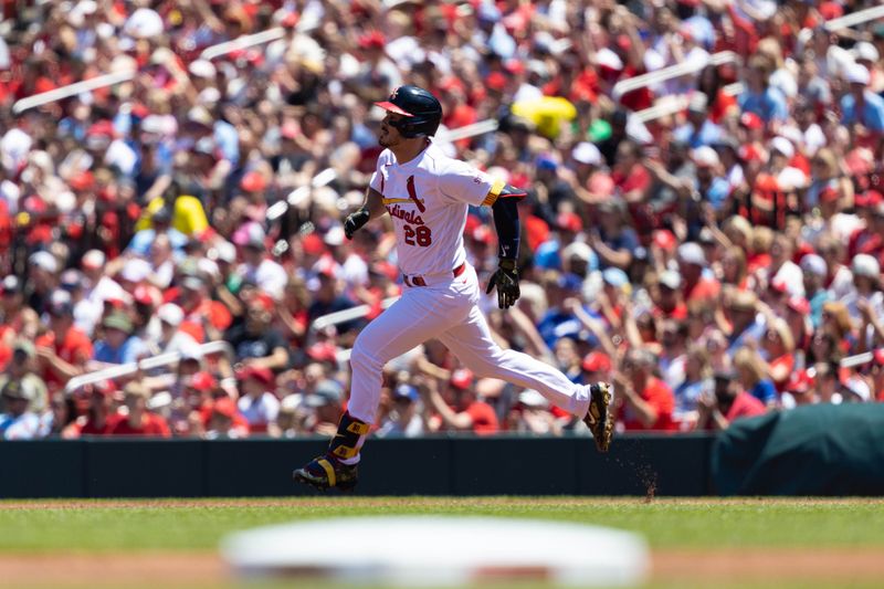 May 21, 2023; St. Louis, Missouri, USA;  St. Louis Cardinals Nolan Arenado (28) hits against the Los Angeles Dodgers at Busch Stadium. Mandatory Credit: Zach Dalin-USA TODAY Sports