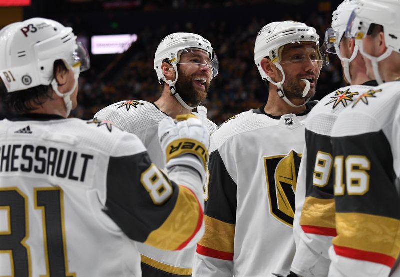 Apr 4, 2023; Nashville, Tennessee, USA; Vegas Golden Knights defenseman Alex Pietrangelo (7) celebrates with teammates after scoring during the second period against the Nashville Predators at Bridgestone Arena. Mandatory Credit: Christopher Hanewinckel-USA TODAY Sports