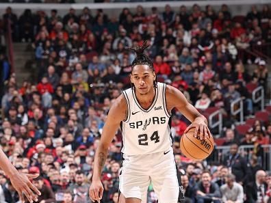 CHICAGO, IL - DECEMBER 21: Devin Vassell #24 of the San Antonio Spurs dribbles the ball during the game against the Chicago Bulls on December 21, 2023 at United Center in Chicago, Illinois. NOTE TO USER: User expressly acknowledges and agrees that, by downloading and or using this photograph, User is consenting to the terms and conditions of the Getty Images License Agreement. Mandatory Copyright Notice: Copyright 2023 NBAE (Photo by Jeff Haynes/NBAE via Getty Images)