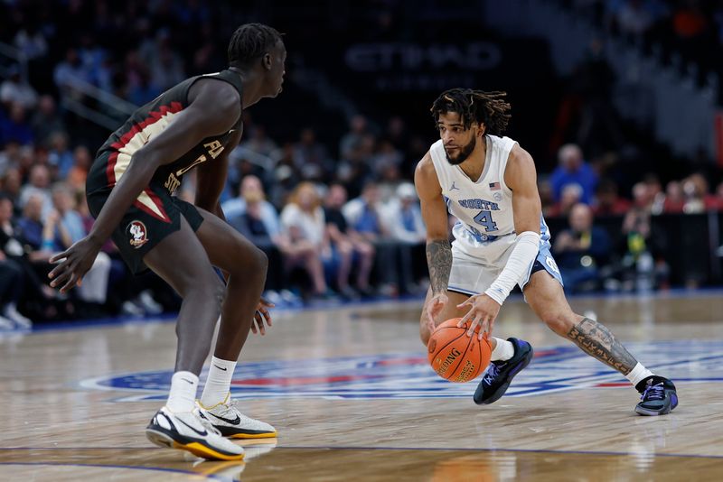 Mar 14, 2024; Washington, D.C., USA; North Carolina guard RJ Davis (4) drives to the basket as Florida State forward Taylor Bol Bowen (10) defends in the second half at Capital One Arena. Mandatory Credit: Geoff Burke-USA TODAY Sports