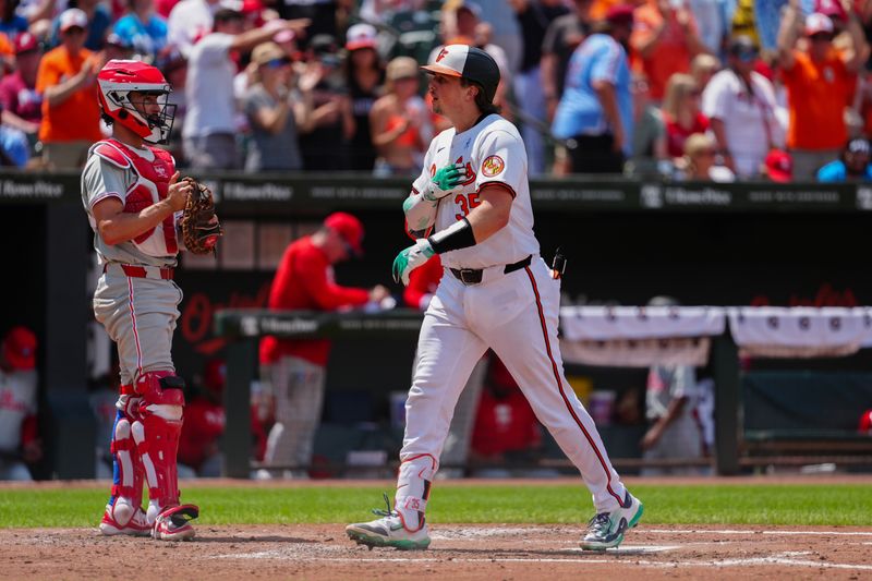 Jun 16, 2024; Baltimore, Maryland, USA; Baltimore Orioles catcher Adley Rutschman (35) reacts to hitting a home run as he crosses home plate against the Philadelphia Phillies during the third inning at Oriole Park at Camden Yards. Mandatory Credit: Gregory Fisher-USA TODAY Sports