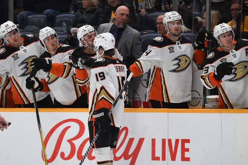 Jan 9, 2024; Nashville, Tennessee, USA; Anaheim Ducks right wing Troy Terry (19) celebrates after a goal during the second period against the Nashville Predators at Bridgestone Arena. Mandatory Credit: Christopher Hanewinckel-USA TODAY Sports