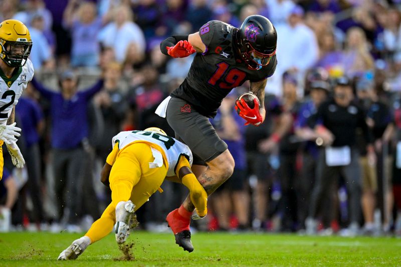 Nov 18, 2023; Fort Worth, Texas, USA; TCU Horned Frogs tight end Jared Wiley (19) catches a pass for a first down against the Baylor Bears during the second half at Amon G. Carter Stadium. Mandatory Credit: Jerome Miron-USA TODAY Sports