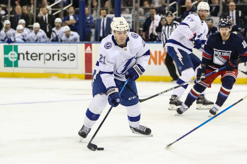 Feb 7, 2024; New York, New York, USA; Tampa Bay Lightning center Brayden Point (21) controls the puck in the first period against the New York Rangers at Madison Square Garden. Mandatory Credit: Wendell Cruz-USA TODAY Sports