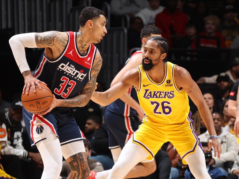 WASHINGTON, DC -? APRIL 3: Spencer Dinwiddie #26 of the Los Angeles Lakers plays defense against Kyle Kuzma #33 of the Washington Wizards during the game on April 3, 2024 at Capital One Arena in Washington, DC. NOTE TO USER: User expressly acknowledges and agrees that, by downloading and or using this Photograph, user is consenting to the terms and conditions of the Getty Images License Agreement. Mandatory Copyright Notice: Copyright 2024 NBAE (Photo by Stephen Gosling/NBAE via Getty Images)