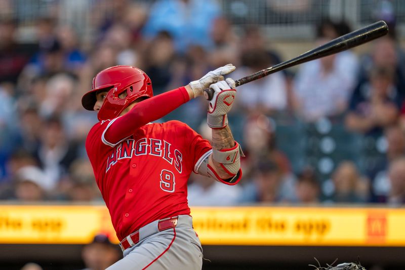 Sep 9, 2024; Minneapolis, Minnesota, USA; Los Angeles Angels shortstop Zach Neto (9) hits a double against the Minnesota Twins in the first inning at Target Field. Mandatory Credit: Jesse Johnson-Imagn Images