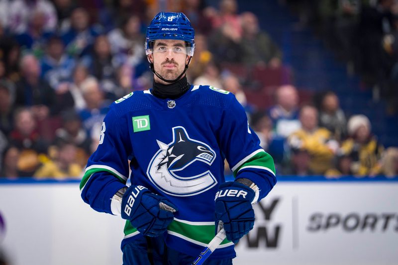 Apr 8, 2024; Vancouver, British Columbia, CAN; Vancouver Canucks forward Conor Garland (8) during a stop in play against the Vegas Golden Knights in the third period at Rogers Arena. Canucks won 4 -3. Mandatory Credit: Bob Frid-USA TODAY Sports