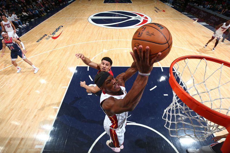 WASHINGTON, DC -? MARCH 31: Jimmy Butler #22 of the Miami Heat drives to the basket during the game against the Washington Wizards on March 31, 2024 at Capital One Arena in Washington, DC. NOTE TO USER: User expressly acknowledges and agrees that, by downloading and or using this Photograph, user is consenting to the terms and conditions of the Getty Images License Agreement. Mandatory Copyright Notice: Copyright 2024 NBAE (Photo by Stephen Gosling/NBAE via Getty Images)