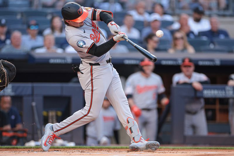 Jun 18, 2024; Bronx, New York, USA; Baltimore Orioles catcher Adley Rutschman (35) singles first inning against the New York Yankees at Yankee Stadium. Mandatory Credit: Vincent Carchietta-USA TODAY Sports