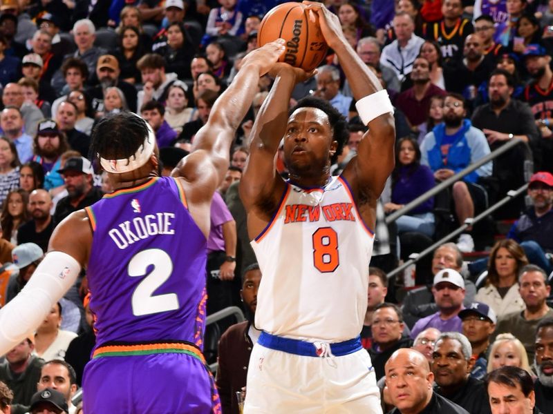 PHOENIX, AZ - NOVEMBER 20: OG Anunoby #8 of the New York Knicks shoots a three point basket during the game against the Phoenix Suns on November 20, 2024 at Footprint Center in Phoenix, Arizona. NOTE TO USER: User expressly acknowledges and agrees that, by downloading and or using this photograph, user is consenting to the terms and conditions of the Getty Images License Agreement. Mandatory Copyright Notice: Copyright 2024 NBAE (Photo by Kate Frese/NBAE via Getty Images)