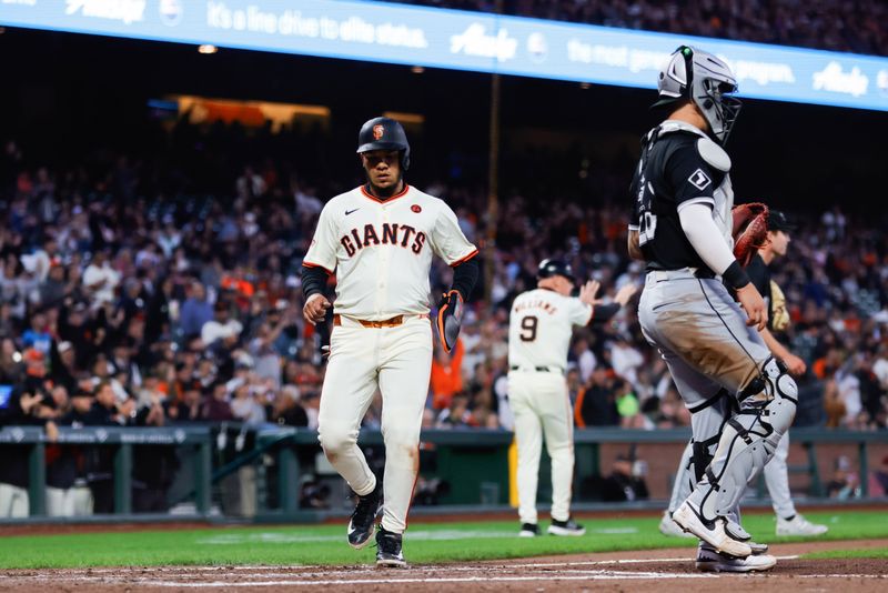 Aug 19, 2024; San Francisco, California, USA; San Francisco Giants second baseman Thairo Estrada (39) scores a run during the fifth inning against the Chicago White Sox at Oracle Park. Mandatory Credit: Sergio Estrada-USA TODAY Sports