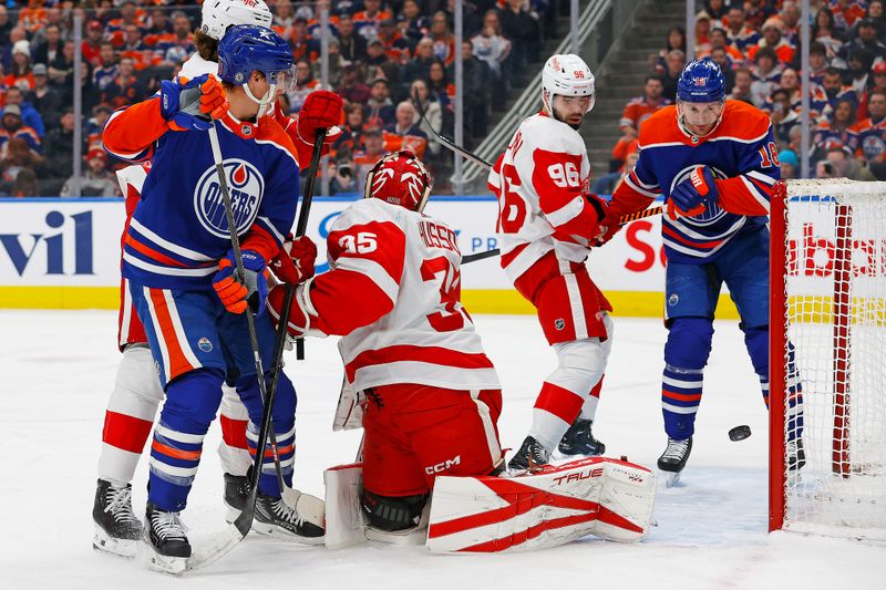 Feb 13, 2024; Edmonton, Alberta, CAN; Detroit Red Wings goaltender Ville Husso (35) makes a save on Edmonton Oilers forward Ryan Nugent-Hopkins (93) during the first period at Rogers Place. Mandatory Credit: Perry Nelson-USA TODAY Sports