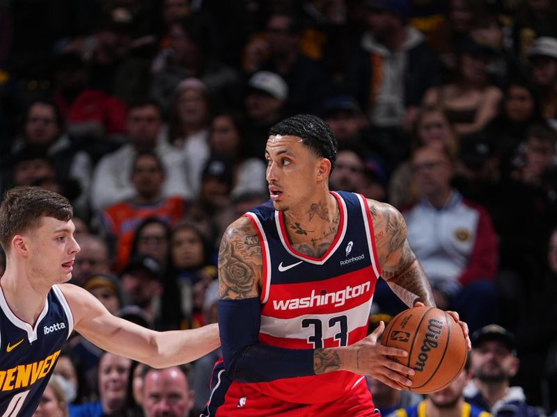 DENVER, CO - FEBRUARY 22: Kyle Kuzma #33 of the Washington Wizards handles the ball during the game against the Denver Nuggets on February 22, 2024 at the Ball Arena in Denver, Colorado. NOTE TO USER: User expressly acknowledges and agrees that, by downloading and/or using this Photograph, user is consenting to the terms and conditions of the Getty Images License Agreement. Mandatory Copyright Notice: Copyright 2024 NBAE (Photo by Garrett Ellwood/NBAE via Getty Images)