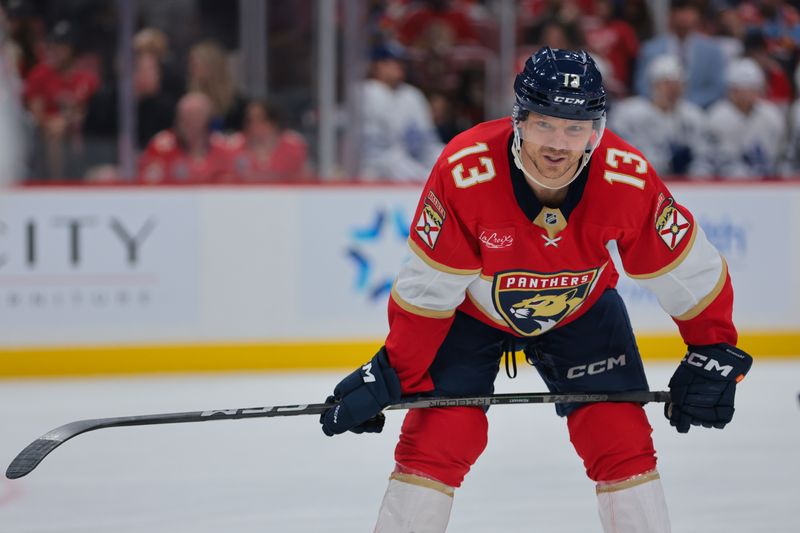 Nov 27, 2024; Sunrise, Florida, USA; Florida Panthers center Sam Reinhart (13) looks on against the Toronto Maple Leafs during the third period at Amerant Bank Arena. Mandatory Credit: Sam Navarro-Imagn Images