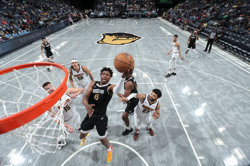 MEMPHIS, TN - APRIL 14: GG Jackson #45 of the Memphis Grizzlies drives to the basket during the game against the Denver Nuggets on April 14, 2024 at FedExForum in Memphis, Tennessee. NOTE TO USER: User expressly acknowledges and agrees that, by downloading and or using this photograph, User is consenting to the terms and conditions of the Getty Images License Agreement. Mandatory Copyright Notice: Copyright 2024 NBAE (Photo by Joe Murphy/NBAE via Getty Images)