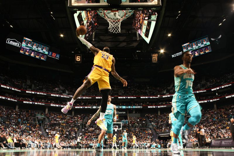 CHARLOTTE, NC - FEBRUARY 5: LeBron James #23 of the Los Angeles Lakers drives to the basket during the game against the Charlotte Hornets on February 5, 2024 at Spectrum Center in Charlotte, North Carolina. NOTE TO USER: User expressly acknowledges and agrees that, by downloading and or using this photograph, User is consenting to the terms and conditions of the Getty Images License Agreement. Mandatory Copyright Notice: Copyright 2024 NBAE (Photo by Kent Smith/NBAE via Getty Images)