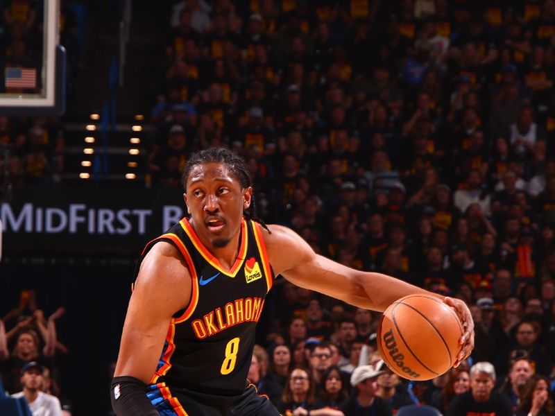 OKLAHOMA CITY, OK - MAY 5:  Jalen Williams #8 of the Oklahoma City Thunder dribbles the ball during the game against the Denver Nuggets during Round Two Game One of the 2025 NBA Playoffs on MAY 5, 2025 at Paycom Center in Oklahoma City, Oklahoma. NOTE TO USER: User expressly acknowledges and agrees that, by downloading and or using this photograph, User is consenting to the terms and conditions of the Getty Images License Agreement. Mandatory Copyright Notice: Copyright 2025 NBAE (Photo by Zach Beeker/NBAE via Getty Images)