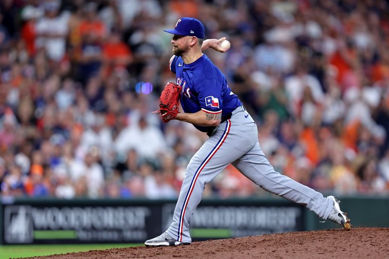 Jul 13, 2024; Houston, Texas, USA; Texas Rangers pitcher Kirby Yates (39) delivers a pitch against the Houston Astros during the tenth inning at Minute Maid Park. Mandatory Credit: Erik Williams-USA TODAY Sports