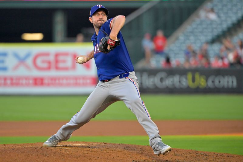 Jul 9, 2024; Anaheim, California, USA;  Texas Rangers starting pitcher Max Scherzer (31) delivers to the plate in the third inning against the Los Angeles Angels at Angel Stadium. Mandatory Credit: Jayne Kamin-Oncea-USA TODAY Sports