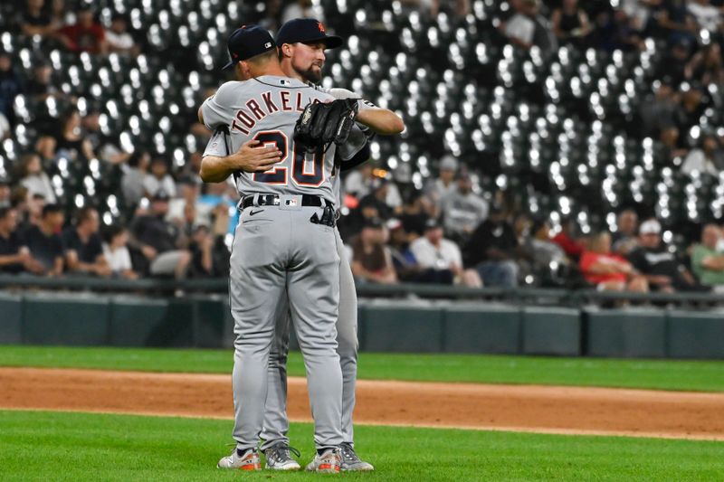 Sep 1, 2023; Chicago, Illinois, USA;  Detroit Tigers second baseman Andre Lipcius (27), back and first baseman Spencer Torkelson (20) hug after the game against the Chicago White Sox at Guaranteed Rate Field. Mandatory Credit: Matt Marton-USA TODAY Sports