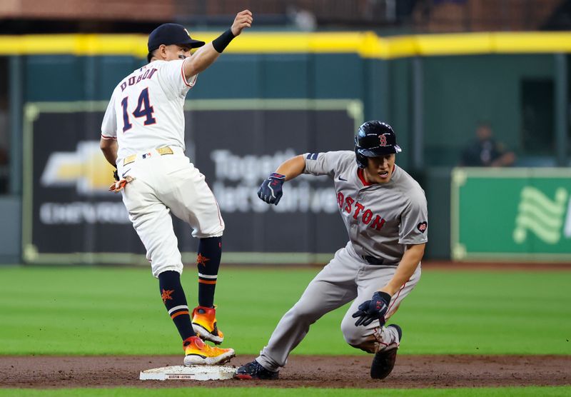 Aug 21, 2024; Houston, Texas, USA;  Boston Red Sox designated hitter Masataka Yoshida (7) is forced out by Houston Astros second baseman Mauricio Dubon (14) in the second inning at Minute Maid Park. Mandatory Credit: Thomas Shea-USA TODAY Sports