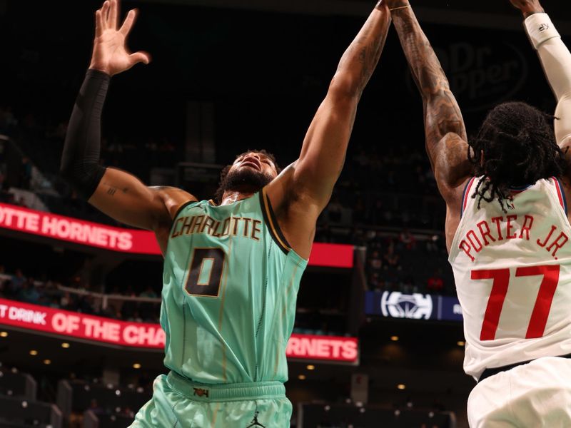 CHARLOTTE, NC - JANUARY 31:  Miles Bridges #0 of the Charlotte Hornets grabs the rebound during the game against the LA Clippers on January 31, 2025 at Spectrum Center in Charlotte, North Carolina. NOTE TO USER: User expressly acknowledges and agrees that, by downloading and or using this photograph, User is consenting to the terms and conditions of the Getty Images License Agreement. Mandatory Copyright Notice: Copyright 2025 NBAE (Photo by Kent Smith/NBAE via Getty Images)