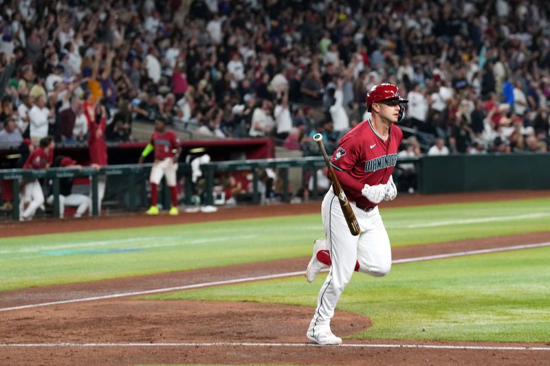 Apr 2, 2024; Phoenix, Arizona, USA; Arizona Diamondbacks first baseman Christian Walker (53) runs the bases after hitting a three run home run against the New York Yankees during the seventh inning at Chase Field. Mandatory Credit: Joe Camporeale-USA TODAY Sports