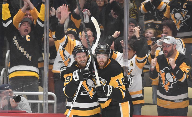 Oct 25, 2025; Pittsburgh, Pennsylvania, USA; Pittsburgh Penguins right wing Anthony Mantha (39) celebrates his goal with right wing Justin Brazeau (16) against the Columbus Blue Jackets during first period action at PPG Paints Arena. Mandatory Credit: Philip G. Pavely-Imagn Images