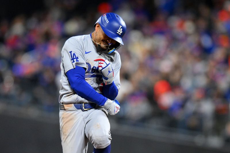 Oct 17, 2024; New York City, New York, USA; Los Angeles Dodgers shortstop Mookie Betts (50) reacts after hitting a two run home run against the New York Mets in the sixth inning during game four of the NLCS for the 2024 MLB playoffs at Citi Field. Mandatory Credit: John Jones-Imagn Images