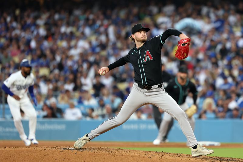 Jul 2, 2024; Los Angeles, California, USA;  Arizona Diamondbacks pitcher Ryne Nelson (19) pitches during the third inning against the Los Angeles Dodgers at Dodger Stadium. Mandatory Credit: Kiyoshi Mio-USA TODAY Sports