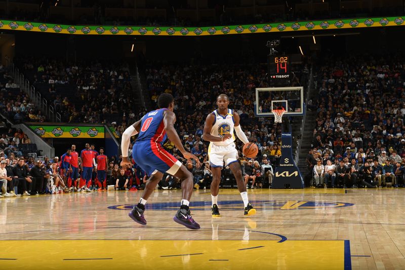 SAN FRANCISCO, CA - OCTOBER 13: Jonathan Kuminga #00 of the Golden State Warriors handles the ball during the game against the Detroit Pistons during a NBA Preseason game on October 13, 2024 at Chase Center in San Francisco, California. NOTE TO USER: User expressly acknowledges and agrees that, by downloading and or using this photograph, user is consenting to the terms and conditions of Getty Images License Agreement. Mandatory Copyright Notice: Copyright 2024 NBAE (Photo by Noah Graham/NBAE via Getty Images)