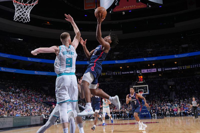 PHILADELPHIA, PA - MARCH 16: Tyrese Maxey #0 of the Philadelphia 76ers drives to the basket during the game against the Charlotte Hornets on March 16, 2024 at the Wells Fargo Center in Philadelphia, Pennsylvania NOTE TO USER: User expressly acknowledges and agrees that, by downloading and/or using this Photograph, user is consenting to the terms and conditions of the Getty Images License Agreement. Mandatory Copyright Notice: Copyright 2024 NBAE (Photo by Jesse D. Garrabrant/NBAE via Getty Images)