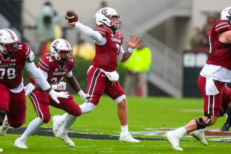 Nov 11, 2023; Columbia, South Carolina, USA; South Carolina Gamecocks quarterback Spencer Rattler (7) throws the ball against the Vanderbilt Commodores in the first quarter at Williams-Brice Stadium. Mandatory Credit: Jeff Blake-USA TODAY Sports