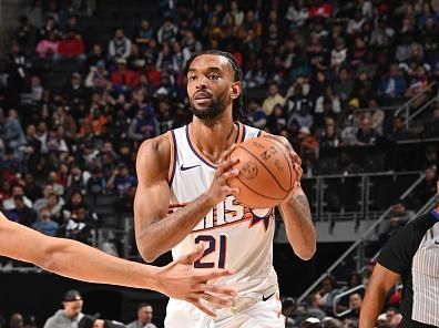 DETROIT, MI - NOVEMBER 5: Keita Bates-Diop #21 of the Phoenix Suns looks to pass the ball during the game against the Detroit Pistons on November 5, 2023 at Little Caesars Arena in Detroit, Michigan. NOTE TO USER: User expressly acknowledges and agrees that, by downloading and/or using this photograph, User is consenting to the terms and conditions of the Getty Images License Agreement. Mandatory Copyright Notice: Copyright 2023 NBAE (Photo by Chris Schwegler/NBAE via Getty Images)