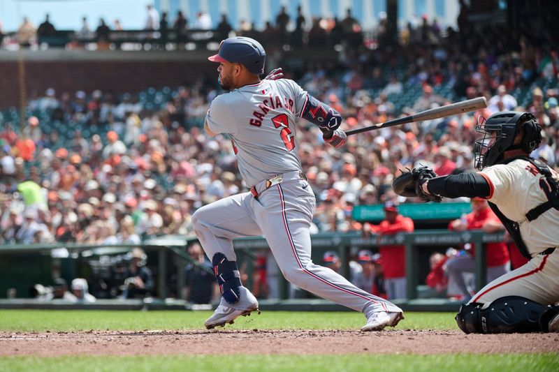 Apr 10, 2024; San Francisco, California, USA; Washington Nationals second baseman Luis Garcia Jr. (2) hits a single against the San Francisco Giants during the fifth inning at Oracle Park. Mandatory Credit: Robert Edwards-USA TODAY Sports