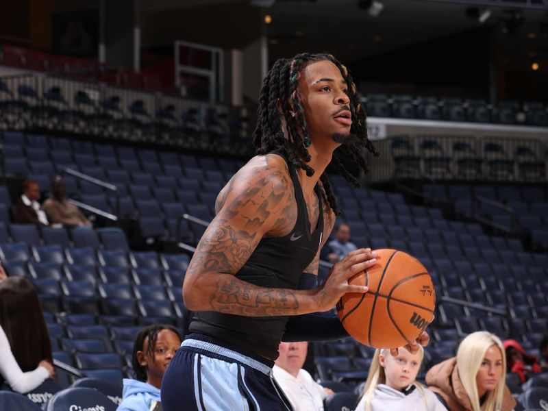 MEMPHIS, TN - DECEMBER 13:  Ja Morant #12 of the Memphis Grizzlies warms up before the game against the Brooklyn Nets on December 13, 2024 at FedExForum in Memphis, Tennessee. NOTE TO USER: User expressly acknowledges and agrees that, by downloading and or using this photograph, User is consenting to the terms and conditions of the Getty Images License Agreement. Mandatory Copyright Notice: Copyright 2024 NBAE (Photo by Joe Murphy/NBAE via Getty Images)