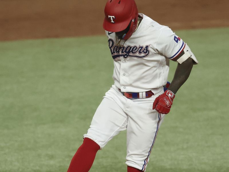 Jun 28, 2023; Arlington, Texas, USA;  Texas Rangers right fielder Adolis Garcia (53) celebrates after hitting a two-run home run during the sixth inning against the Detroit Tigers at Globe Life Field. Mandatory Credit: Kevin Jairaj-USA TODAY Sports