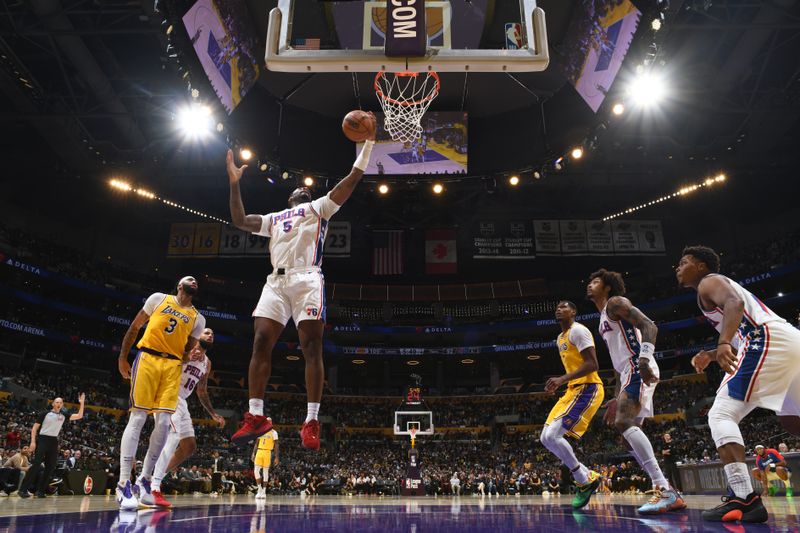 LOS ANGELES, CA - NOVEMBER 8: Andre Drummond #5 of the Philadelphia 76ers goes up for the rebound during the game against the Los Angeles Lakers on Novemberr 8, 2024 at Crypto.Com Arena in Los Angeles, California. NOTE TO USER: User expressly acknowledges and agrees that, by downloading and/or using this Photograph, user is consenting to the terms and conditions of the Getty Images License Agreement. Mandatory Copyright Notice: Copyright 2024 NBAE (Photo by Adam Pantozzi/NBAE via Getty Images)