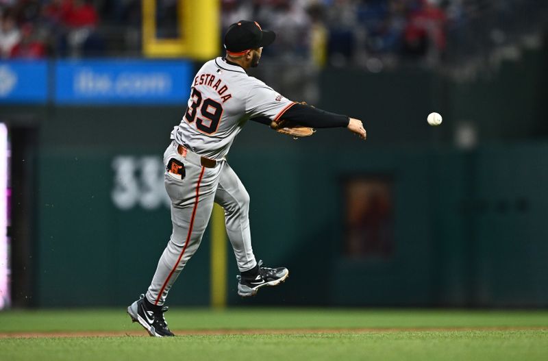 May 5, 2024; Philadelphia, Pennsylvania, USA; San Francisco Giants second baseman Thairo Estrada (39) throws to first against the Philadelphia Phillies in the third inning at Citizens Bank Park. Mandatory Credit: Kyle Ross-USA TODAY Sports