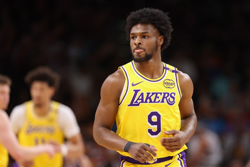 PHOENIX, ARIZONA - OCTOBER 17: Bronny James #9 of the Los Angeles Lakers reacts during the second half of the preseason NBA game against the Phoenix Suns at Footprint Center on October 17, 2024 in Phoenix, Arizona. NOTE TO USER: User expressly acknowledges and agrees that, by downloading and/or using this photograph, user is consenting to the terms and conditions of the Getty Images License Agreement.  (Photo by Christian Petersen/Getty Images)