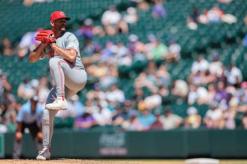 Jun 5, 2024; Denver, Colorado, USA; Cincinnati Reds relief pitcher Nick Martinez (28) delivers a pitch during the seventh inning against the Colorado Rockies at Coors Field. Mandatory Credit: Andrew Wevers-USA TODAY Sports