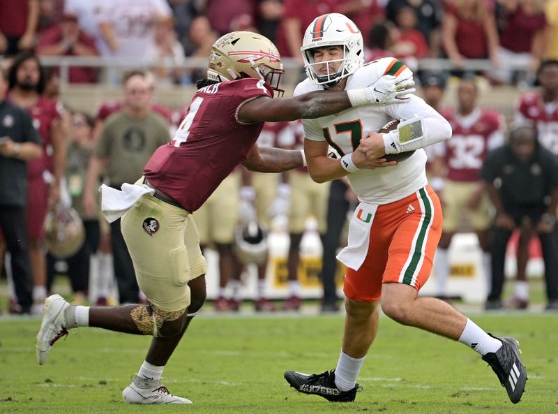 Nov 11, 2023; Tallahassee, Florida, USA; Florida State Seminoles linebacker Kalen Deloach (4) sacks Miami Hurricanes quarterback Emory Williams (17) during the first quarter at Doak S. Campbell Stadium. Mandatory Credit: Melina Myers-USA TODAY Sports