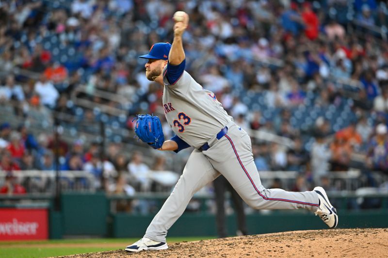 Apr 26, 2025; Washington, District of Columbia, USA; New York Mets pitcher A.J. Minter (33) throws to the Washington Nationals during the eighth inning at Nationals Park. Mandatory Credit: Brad Mills-Imagn Images