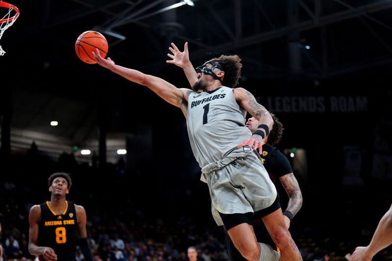 Feb 8, 2024; Boulder, Colorado, USA; Colorado Buffaloes guard J'Vonne Hadley (1) shoots the ball in the second half \V| at the CU Events Center. Mandatory Credit: Ron Chenoy-USA TODAY Sports