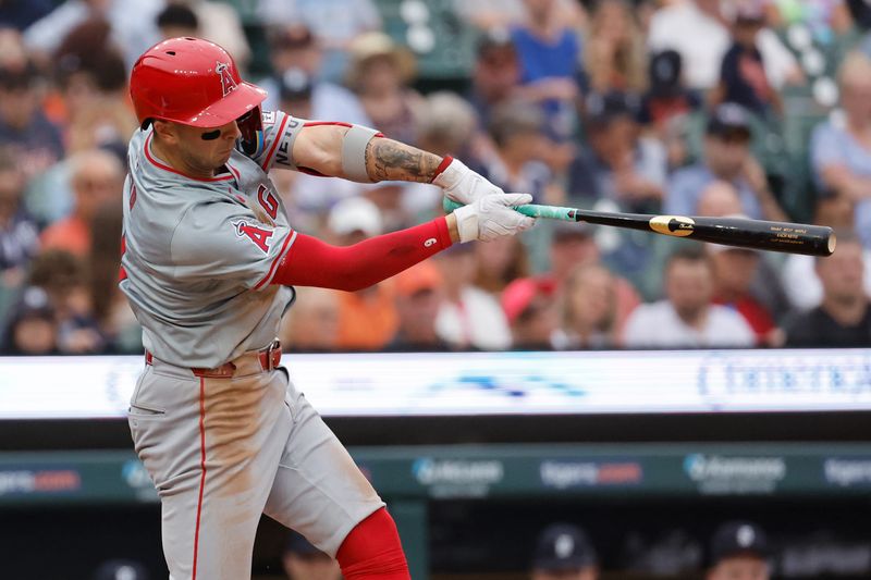 Aug 29, 2024; Detroit, Michigan, USA;  Los Angeles Angels shortstop Zach Neto (9) hits a two run home run in the fifth inning against the Detroit Tigers at Comerica Park. Mandatory Credit: Rick Osentoski-USA TODAY Sports