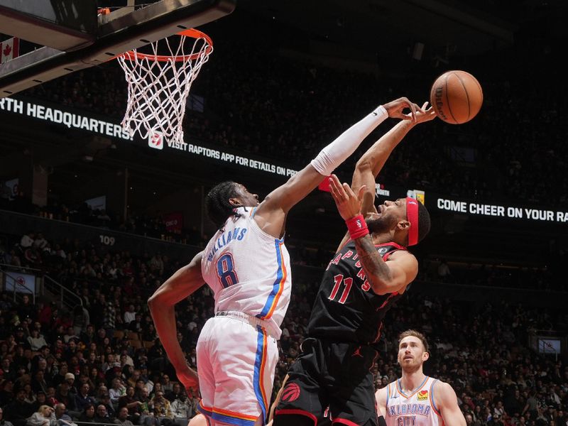 TORONTO, CANADA - MARCH 22:  Jalen Williams #8 of the Oklahoma City Thunder plays defense against Bruce Brown #11 of the Toronto Raptors on March 22, 2024 at the Scotiabank Arena in Toronto, Ontario, Canada.  NOTE TO USER: User expressly acknowledges and agrees that, by downloading and or using this Photograph, user is consenting to the terms and conditions of the Getty Images License Agreement.  Mandatory Copyright Notice: Copyright 2024 NBAE (Photo by Mark Blinch/NBAE via Getty Images)