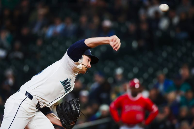 Apr 29, 2025; Seattle, Washington, USA; Seattle Mariners starting pitcher Bryce Miller (50) throws against the Los Angeles Angels during the first inning at T-Mobile Park. Mandatory Credit: Joe Nicholson-Imagn Images