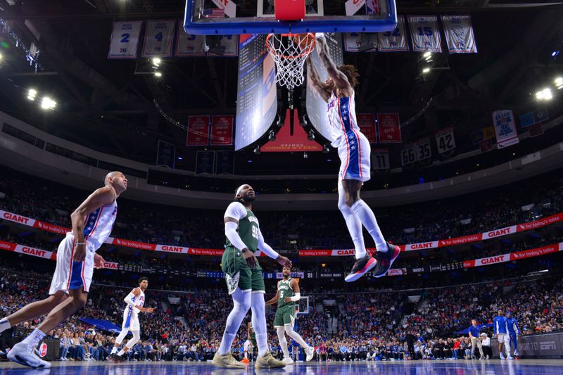 PHILADELPHIA, PA - FEBRUARY 25: Kelly Oubre Jr. #9 of the Philadelphia 76ers dunks the ball during the game against the Milwaukee Bucks on February 25, 2024 at the Wells Fargo Center in Philadelphia, Pennsylvania NOTE TO USER: User expressly acknowledges and agrees that, by downloading and/or using this Photograph, user is consenting to the terms and conditions of the Getty Images License Agreement. Mandatory Copyright Notice: Copyright 2024 NBAE (Photo by Jesse D. Garrabrant/NBAE via Getty Images)