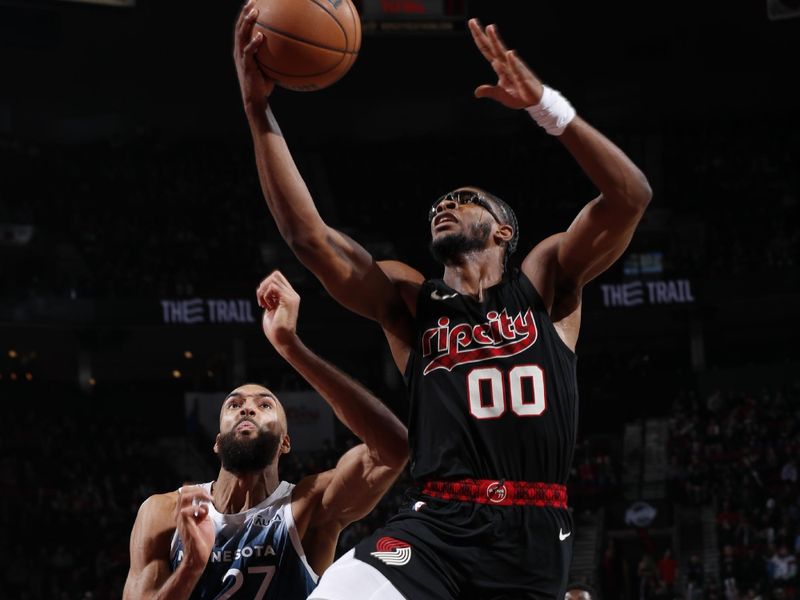 PORTLAND, OR - FEBRUARY 15: Scoot Henderson #00 of the Portland Trail Blazers drives to the basket during the game against the Minnesota Timberwolves on February 15, 2024 at the Moda Center Arena in Portland, Oregon. NOTE TO USER: User expressly acknowledges and agrees that, by downloading and or using this photograph, user is consenting to the terms and conditions of the Getty Images License Agreement. Mandatory Copyright Notice: Copyright 2024 NBAE (Photo by Cameron Browne/NBAE via Getty Images)